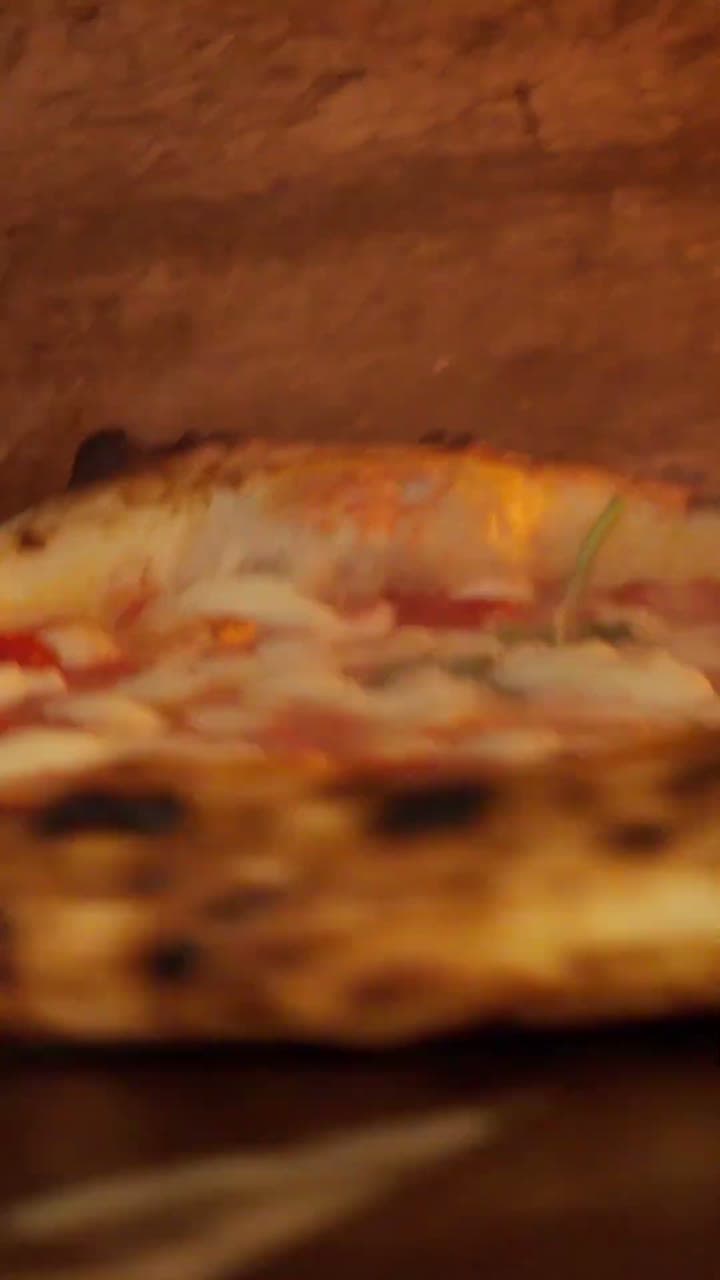 Positano, pizzería napolitana en el Eixample de Barcelona — ilustración del pueblo de la Costa Amalfitana